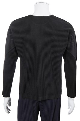 Lot 137 - An Issey Miyake Homme Plissé navy pleated polyester suit, circa 2017