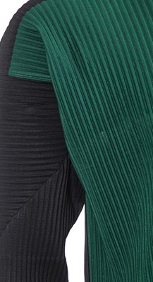 Lot 137 - An Issey Miyake Homme Plissé navy pleated polyester suit, circa 2017