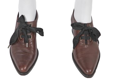 Lot 106 - A Jean Paul Gaultier men's grey wool suit ensemble and shoes, circa 1990