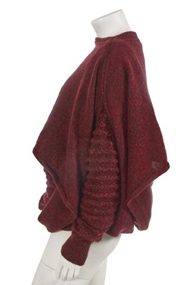 Lot 444 - An Issey Miyake maroon wool jumper/dress, circa 1980