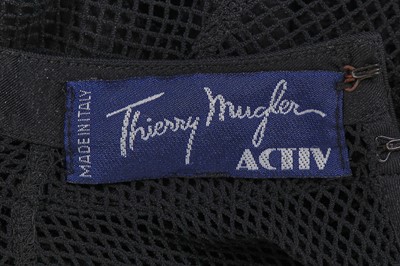 Lot 625 - A Thierry Mugler black lycra and net dress, 1987-1993