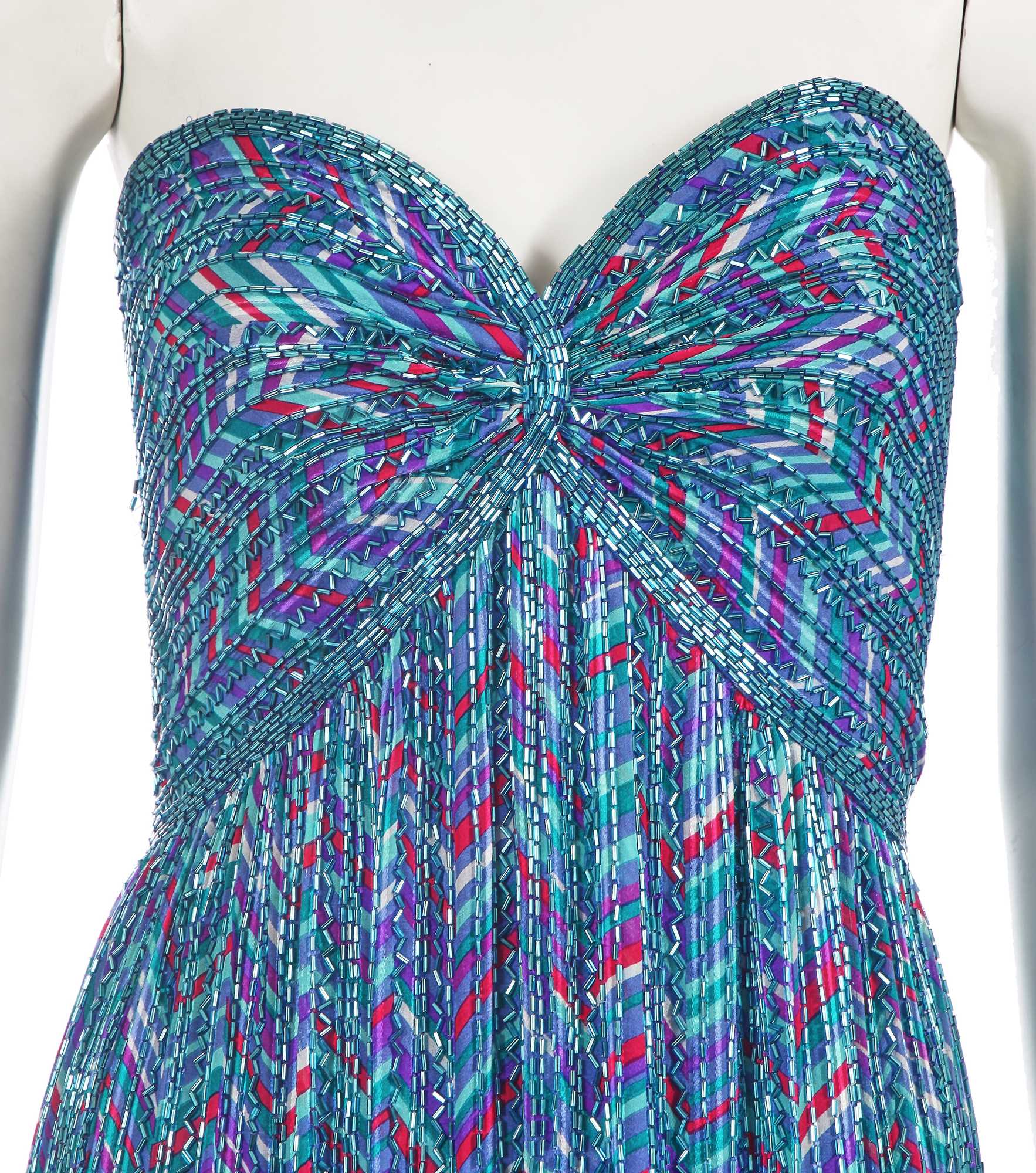 Lot 619 - A Bob Mackie printed and beaded silk satin dress, 1980s