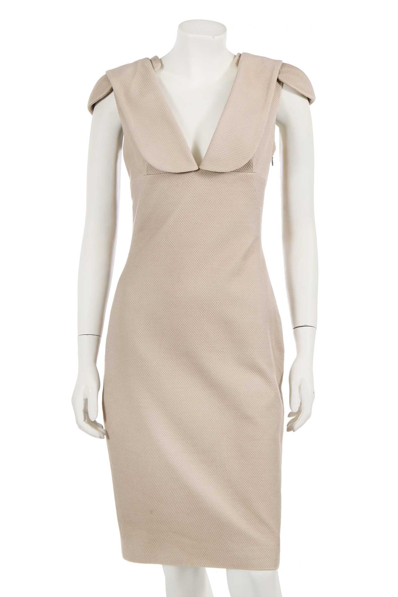 Lot 318 - An Alexander McQueen by Sarah Burton beige cotton-blend piqué cocktail dress, Resort 2011
