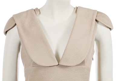 Lot 318 - An Alexander McQueen by Sarah Burton beige cotton-blend piqué cocktail dress, Resort 2011