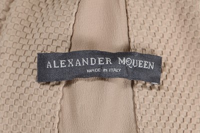 Lot 318 - An Alexander McQueen by Sarah Burton beige cotton-blend piqué cocktail dress, Resort 2011