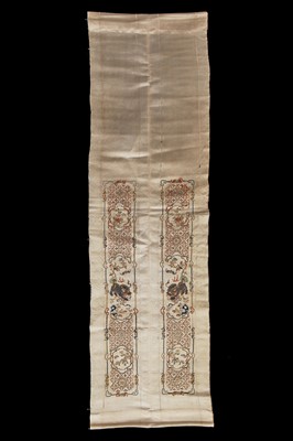 Lot 932 - A pair of Chinese embroidered silk sleeve bands, late 19th century