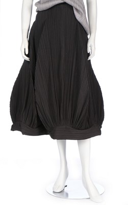 Lot 167 - An Issey Miyake pleated polyester ensemble,...