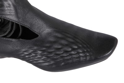Lot 266 - A pair of Zaha Hadid for Lacoste black leather shoes, 2009