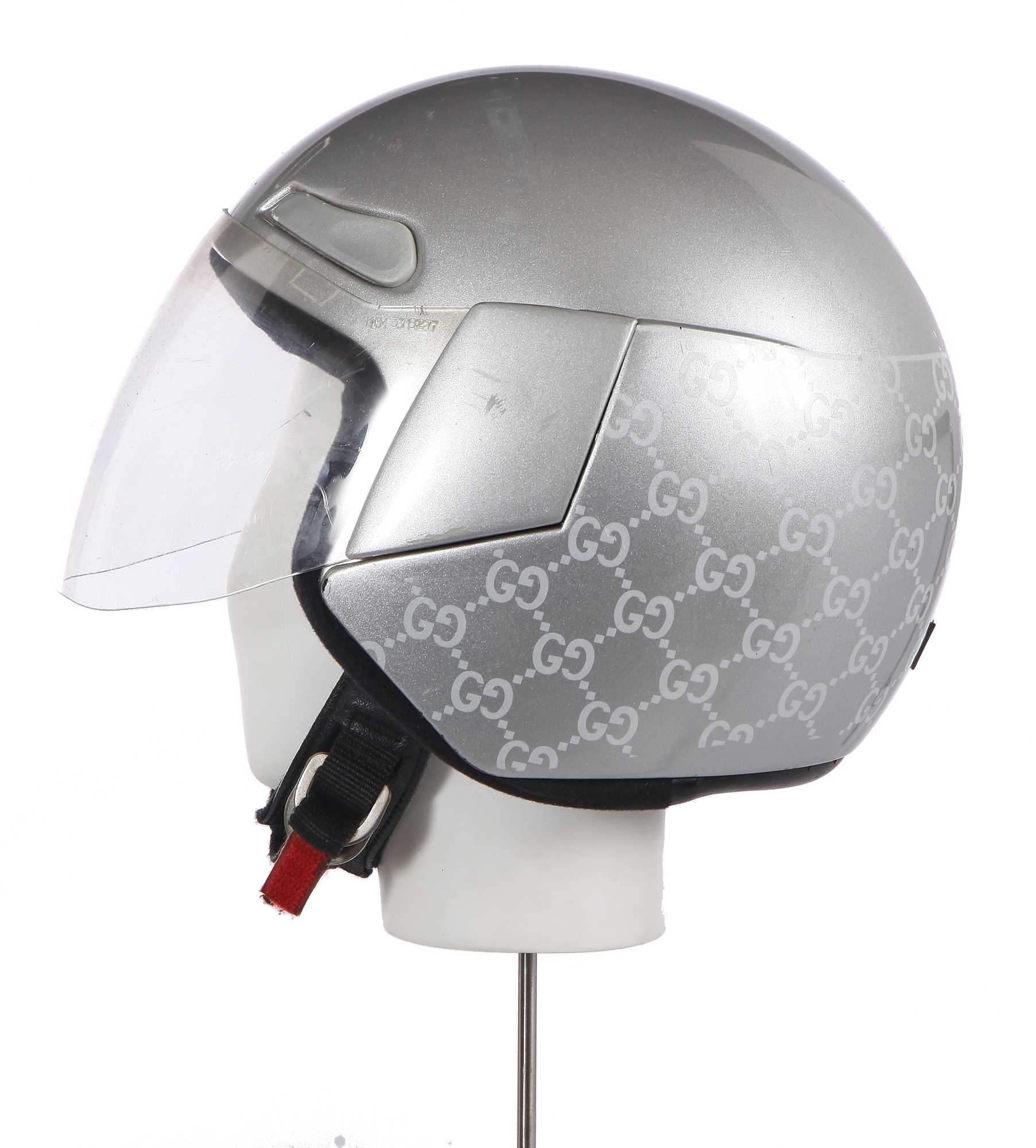 Lot 261 - A Gucci by Tom Ford silver fibreglass 'Guccissima Crash' helmet, 1997