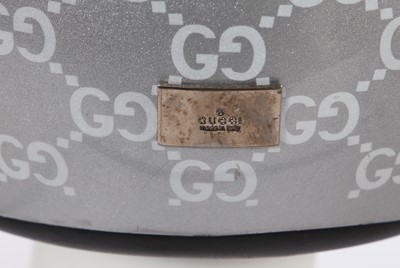 Lot 261 - A Gucci by Tom Ford silver fibreglass 'Guccissima Crash' helmet, 1997