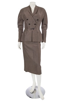 Lot 734 - A Pierre Balmain light brown wool suit, early 1950s
