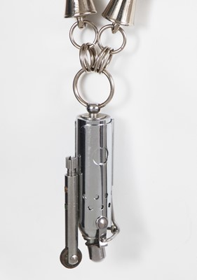 Lot 96 - A Jean Paul Gaultier stainless steel lighter necklace, circa 1987