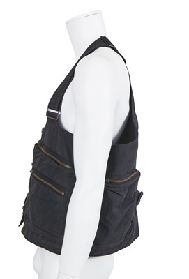 Lot 124 - An Issey Miyake men's navy cotton-blend convertible waistcoat/bag, 1988