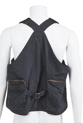 Lot 124 - An Issey Miyake men's navy cotton-blend convertible waistcoat/bag, 1988