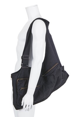 Lot 124 - An Issey Miyake men's navy cotton-blend convertible waistcoat/bag, 1988