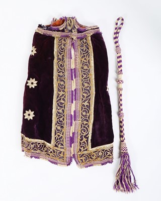 Lot 453 - An embroidered purple velvet torah cover,...