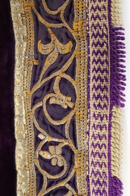 Lot 453 - An embroidered purple velvet torah cover,...