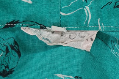 Lot 33 - A rare and early Westwood/McLaren Let it Rock caveman print linen shirt, circa 1972