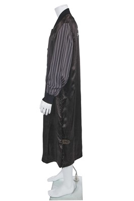 Lot 121 - A Comme des Garçons black satin staff coat, Spring-Summer 1986