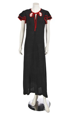 Lot 658 - A Radley black and red moss crêpe dress, circa 1972