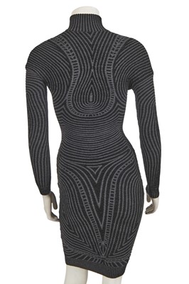 Lot 374 - An Alexander McQueen black and grey knitted wool dress, circa 2007