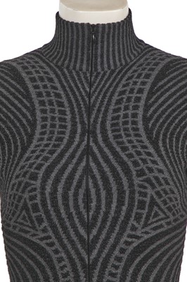 Lot 374 - An Alexander McQueen black and grey knitted wool dress, circa 2007