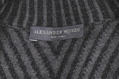 Lot 374 - An Alexander McQueen black and grey knitted wool dress, circa 2007