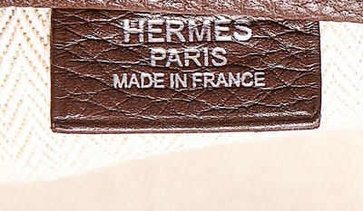 Lot 96 - An Hermès ebony calfskin men's 'Hebdo'...