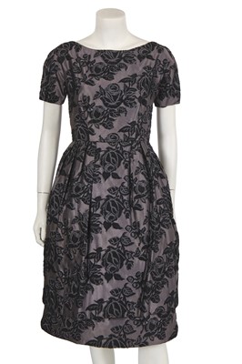 Lot 723 - A Bellville et Cie couture grey and black silk and wool cocktail dress, 1960s