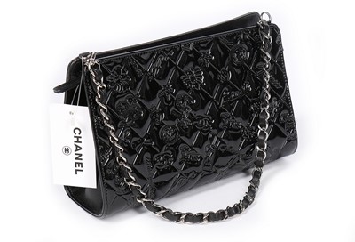 Lot 121 - A Chanel black embossed patent leather handbag,...