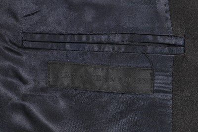 Lot 31 - An Alexander McQueen men's black silk jacquard woven coat, Autumn-Winter 2009-10