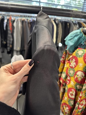 Lot 31 - An Alexander McQueen men's black silk jacquard woven coat, Autumn-Winter 2009-10