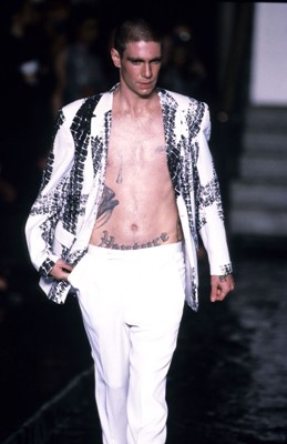 Lot 22 - A pair of Alexander McQueen men's tyre print cotton trousers, 'La Poupee' collection, Spring-Summer 1997