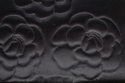 Lot 123 - A Chanel black satin shoulder bag, 1990s,...