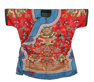Lot 912 - An embroidered orange satin mangao, circa 1920