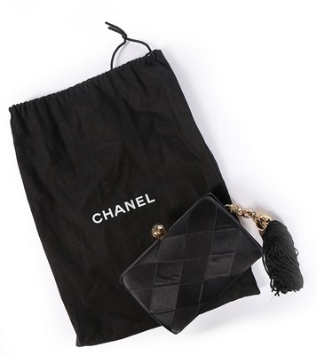 Lot 126 - A Chanel black satin minaudière, probably...