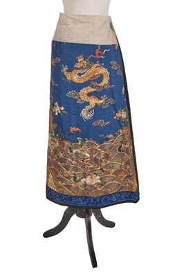 Lot 921 - An embroidered mid blue silk altar fronta (altered to form a skirt panel) Chinese, late 19th century