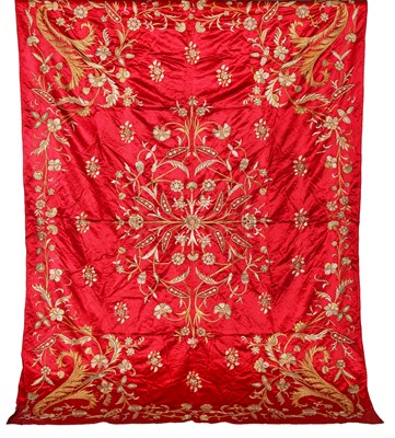 Lot 943 - An embroidered crimson satin coverlet or hanging, Ottoman Turkish, early 20th century