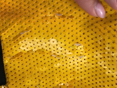 Lot 233 - A Chanel by Karl Lagerfeld yellow sequined 'Scuba' jacket, Spring-Summer 1991