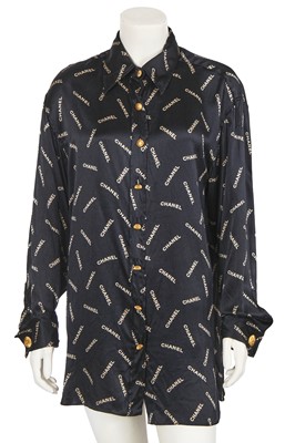 Lot 238 - A Chanel by Karl Lagerfeld printed silk blouse and matching gilt cufflinks, circa 1988
