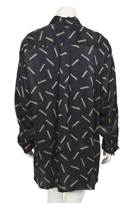 Lot 238 - A Chanel by Karl Lagerfeld printed silk blouse and matching gilt cufflinks, circa 1988