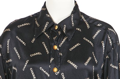 Lot 238 - A Chanel by Karl Lagerfeld printed silk blouse and matching gilt cufflinks, circa 1988