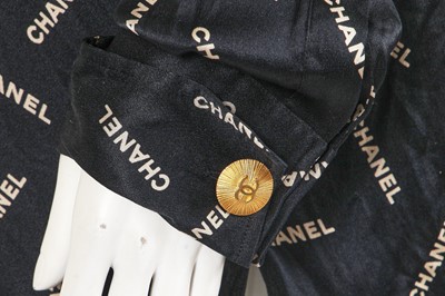 Lot 238 - A Chanel by Karl Lagerfeld printed silk blouse and matching gilt cufflinks, circa 1988