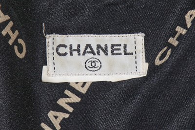 Lot 238 - A Chanel by Karl Lagerfeld printed silk blouse and matching gilt cufflinks, circa 1988