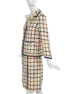 Lot 57 - An haute couture suit, attributed to Chanel. circa 1975