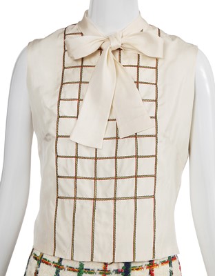 Lot 57 - An haute couture suit, attributed to Chanel. circa 1975