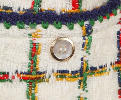 Lot 57 - An haute couture suit, attributed to Chanel. circa 1975