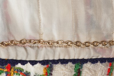 Lot 57 - An haute couture suit, attributed to Chanel. circa 1975