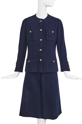 Lot 58 - A Chanel haute couture navy blue jersey suit, circa 1973