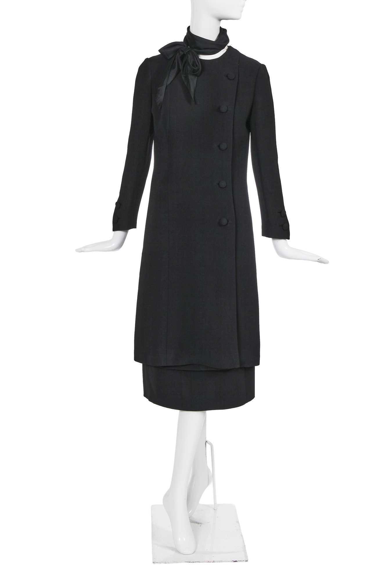 Lot 60 - A Gabrielle Chanel haute couture black wool and silk ensemble, circa 1969